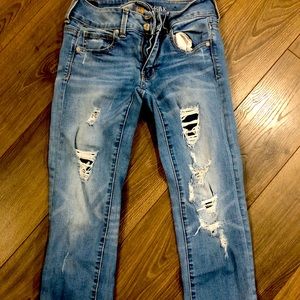 Distressed, cropped, super stretch skinny jeans